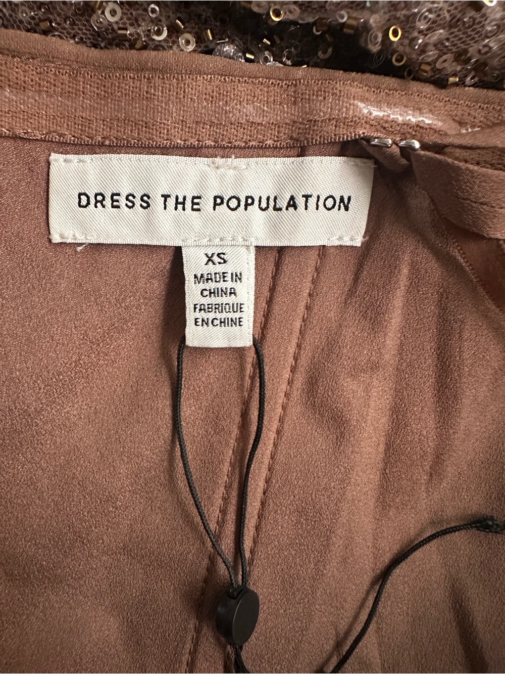 Dress the Population
Strapless Sweetheart Bodycon Tea Length
Dress - Picture 7 of 8